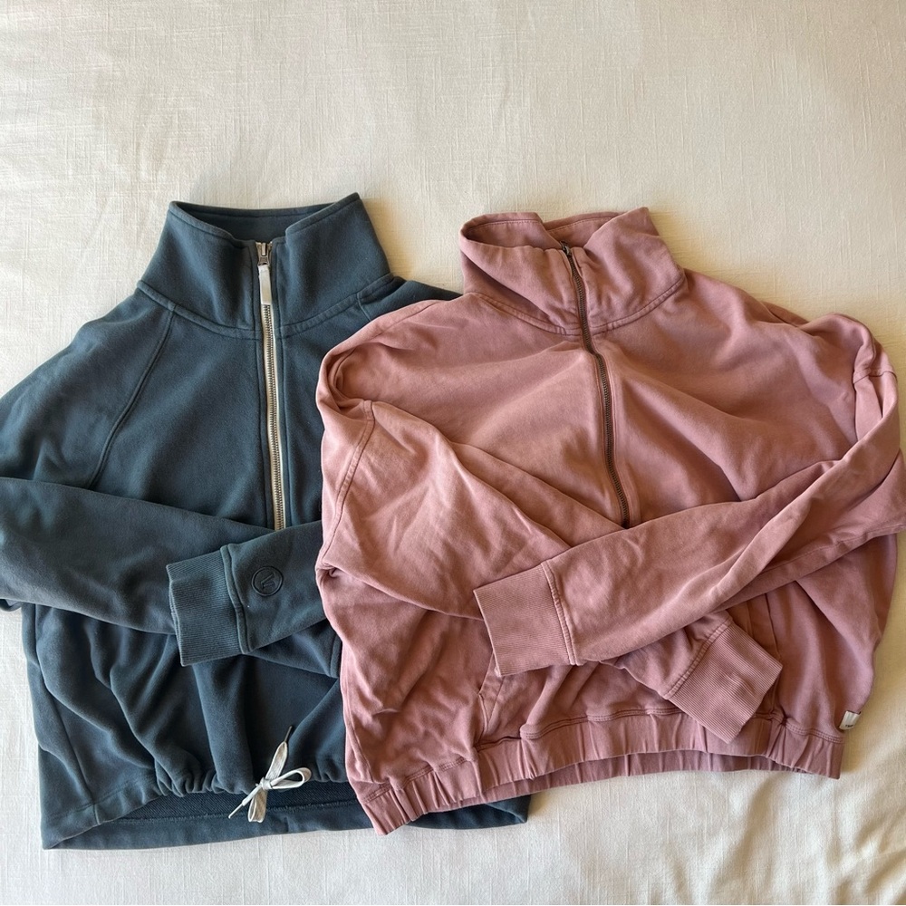 Two Vuori half-zip sweatshirts. Size medium